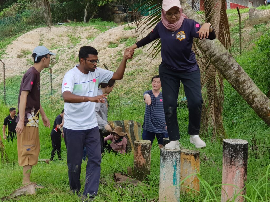 team bulding activities - Boosting Team Morale walk on column